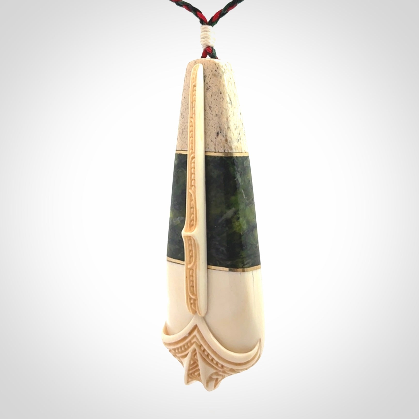 Hand carved bone, whale bone, New Zealand Jade, Brass and Opal pendant