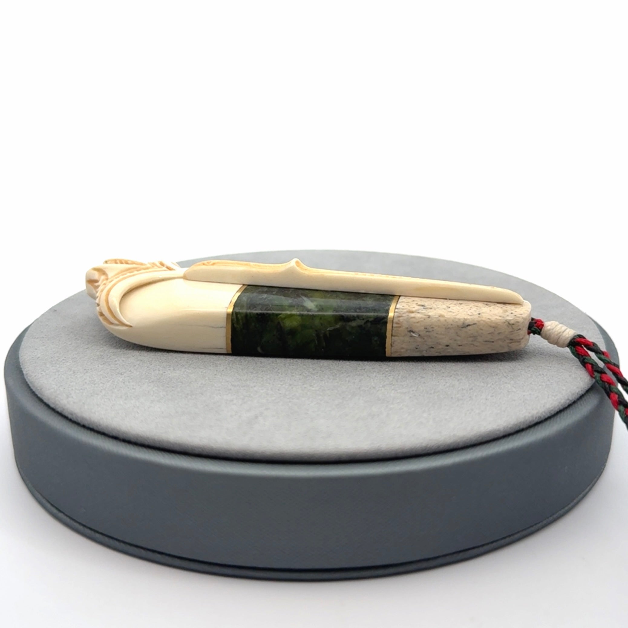 Hand carved bone, whale bone, New Zealand Jade, Brass and Opal pendant