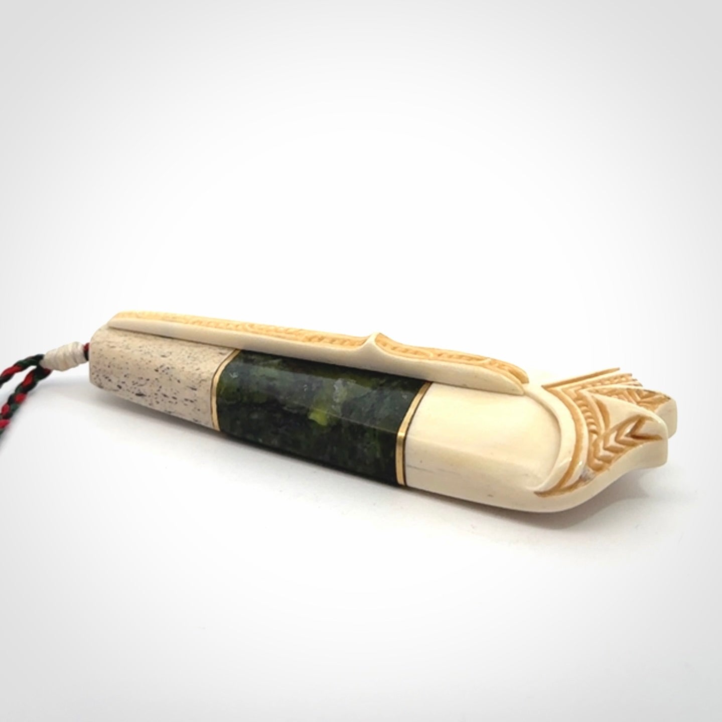 Hand carved bone, whale bone, New Zealand Jade, Brass and Opal pendant
