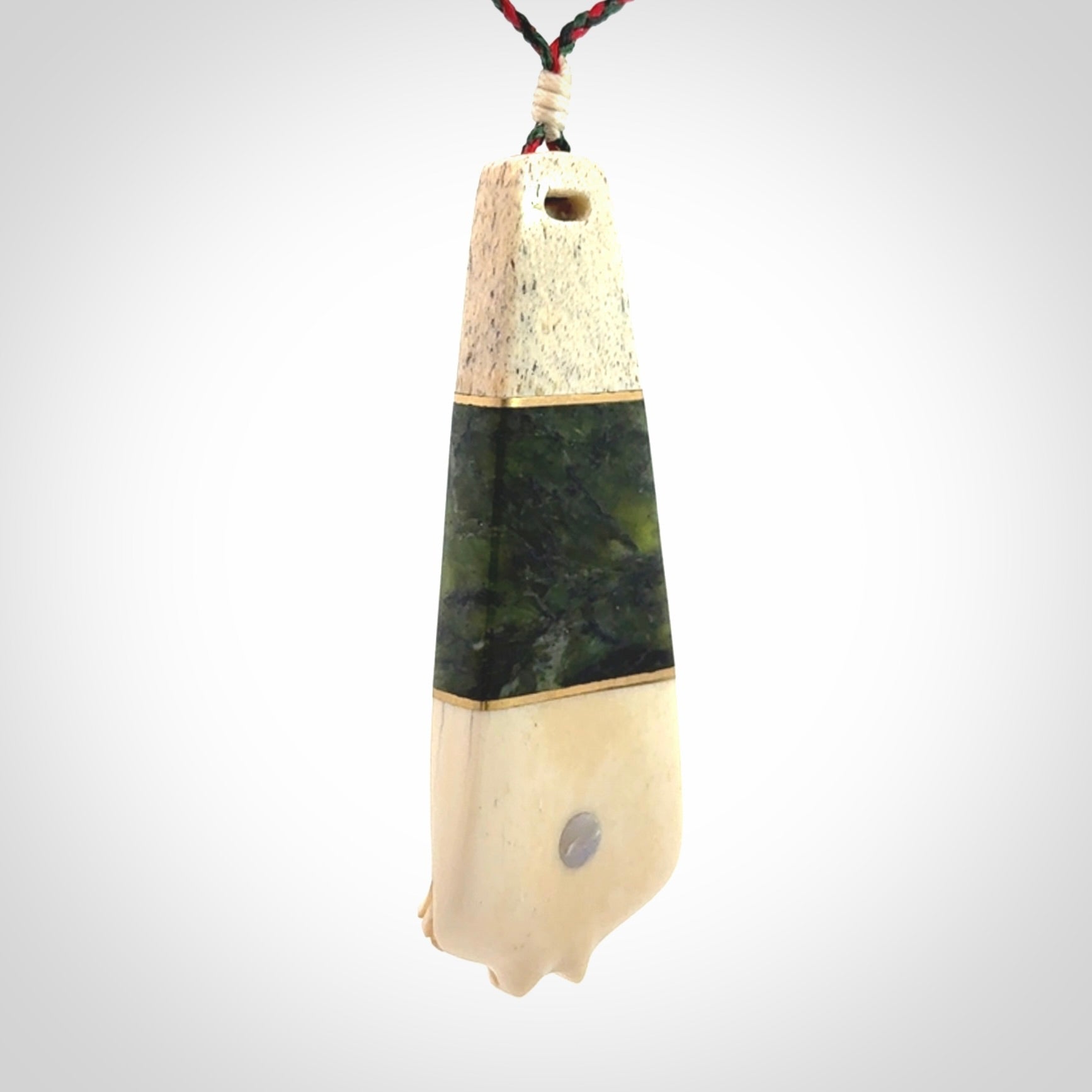 Hand carved bone, whale bone, New Zealand Jade, Brass and Opal pendant