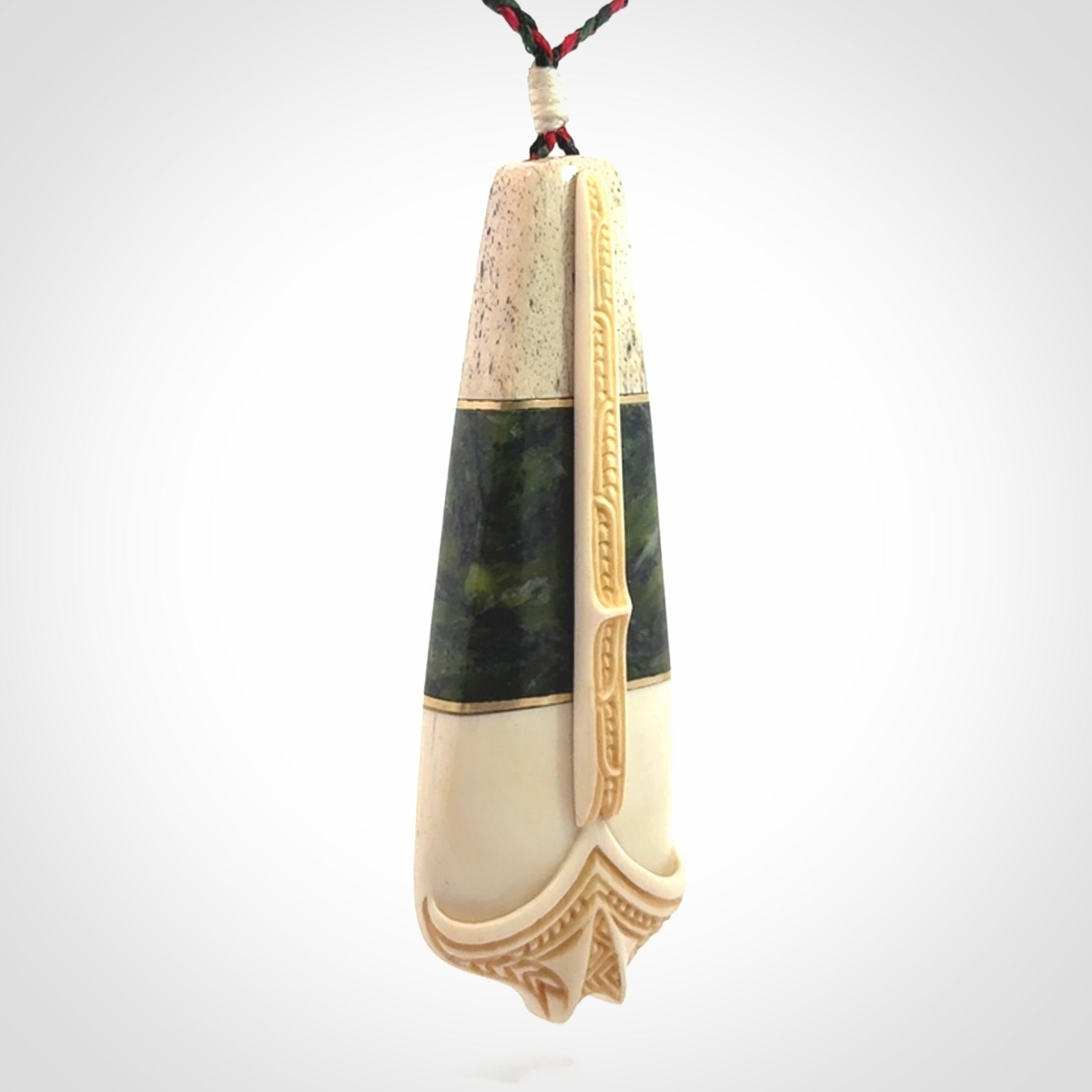Hand carved bone, whale bone, New Zealand Jade, Brass and Opal pendant