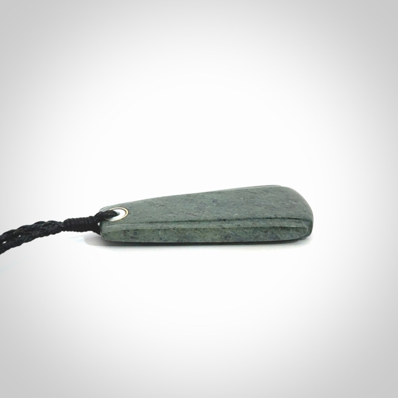 This is a wonderful New Zealand Jade Toki drop pendant.