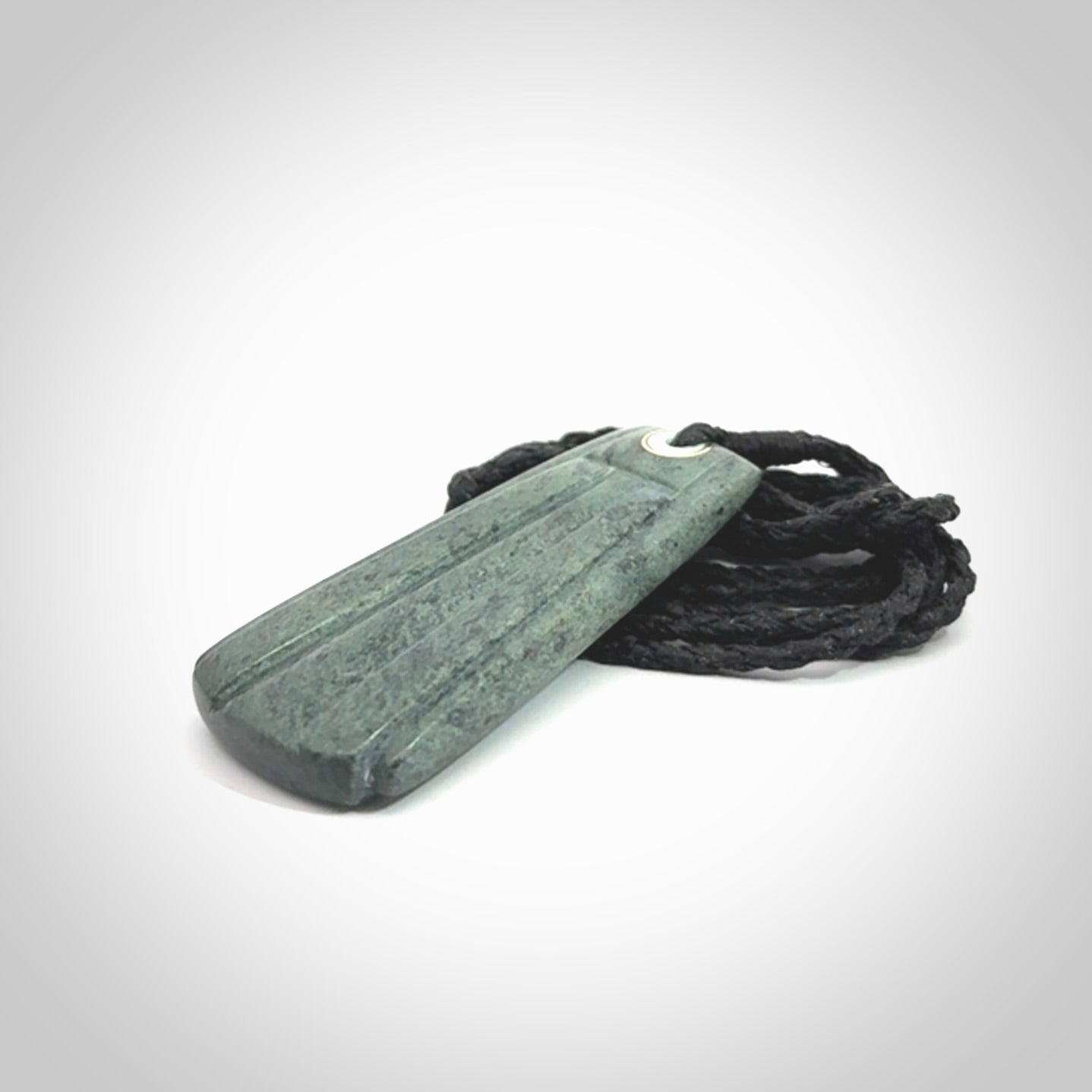 This is a wonderful New Zealand Jade Toki drop pendant.