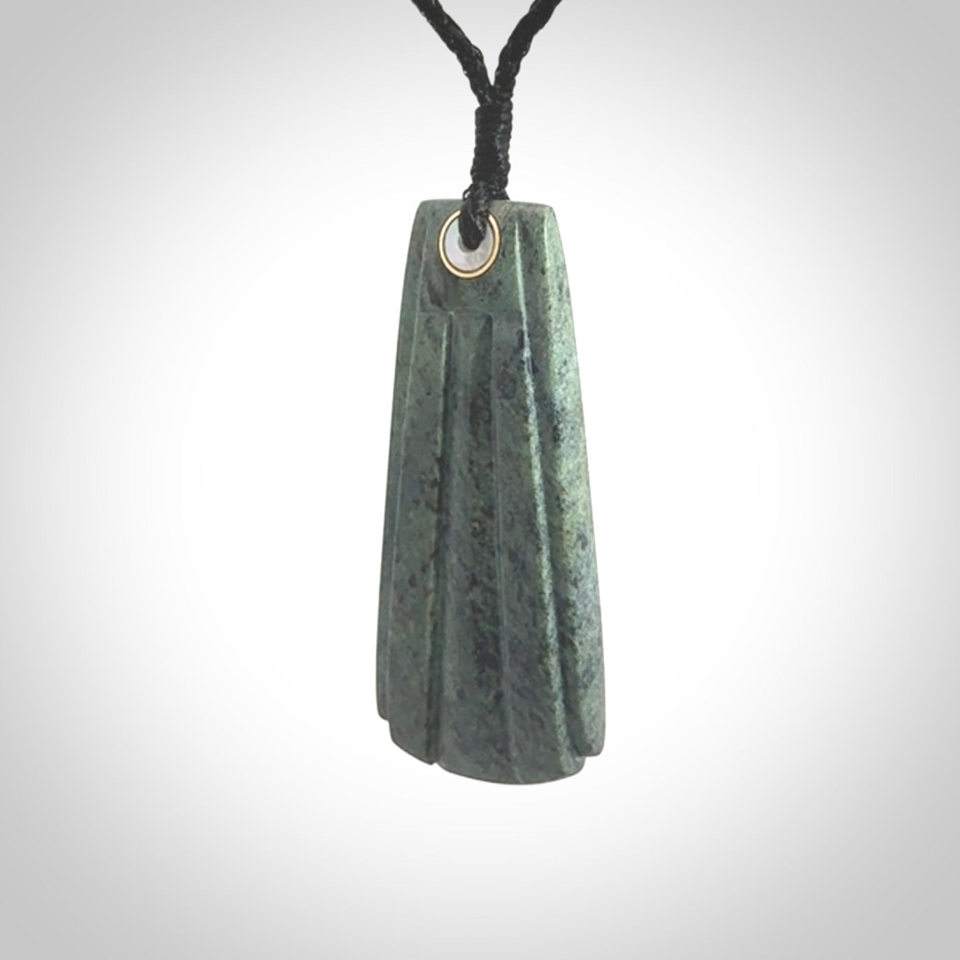 This is a wonderful New Zealand Jade Toki drop pendant.
