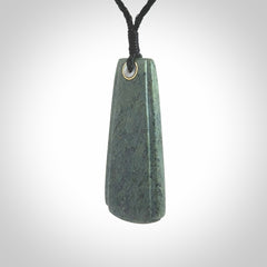 This is a wonderful New Zealand Jade Toki drop pendant.