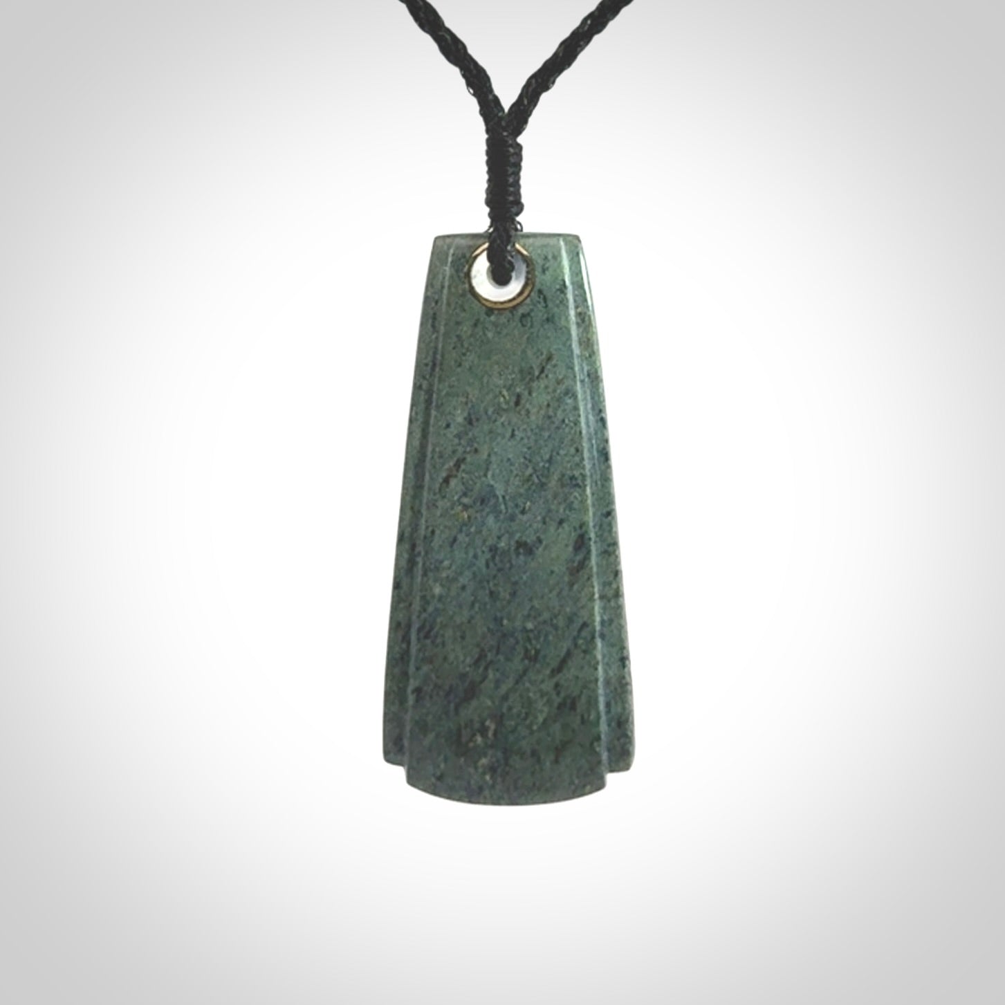 This is a wonderful New Zealand Jade Toki drop pendant.