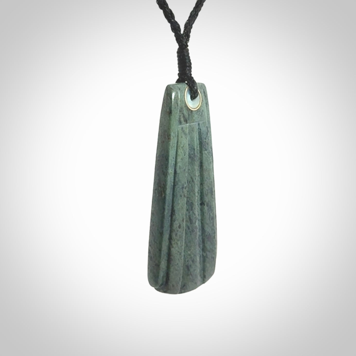 This is a wonderful New Zealand Jade Toki drop pendant.