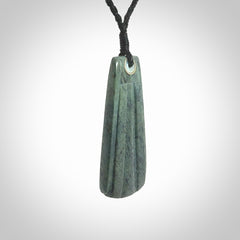 This is a wonderful New Zealand Jade Toki drop pendant.