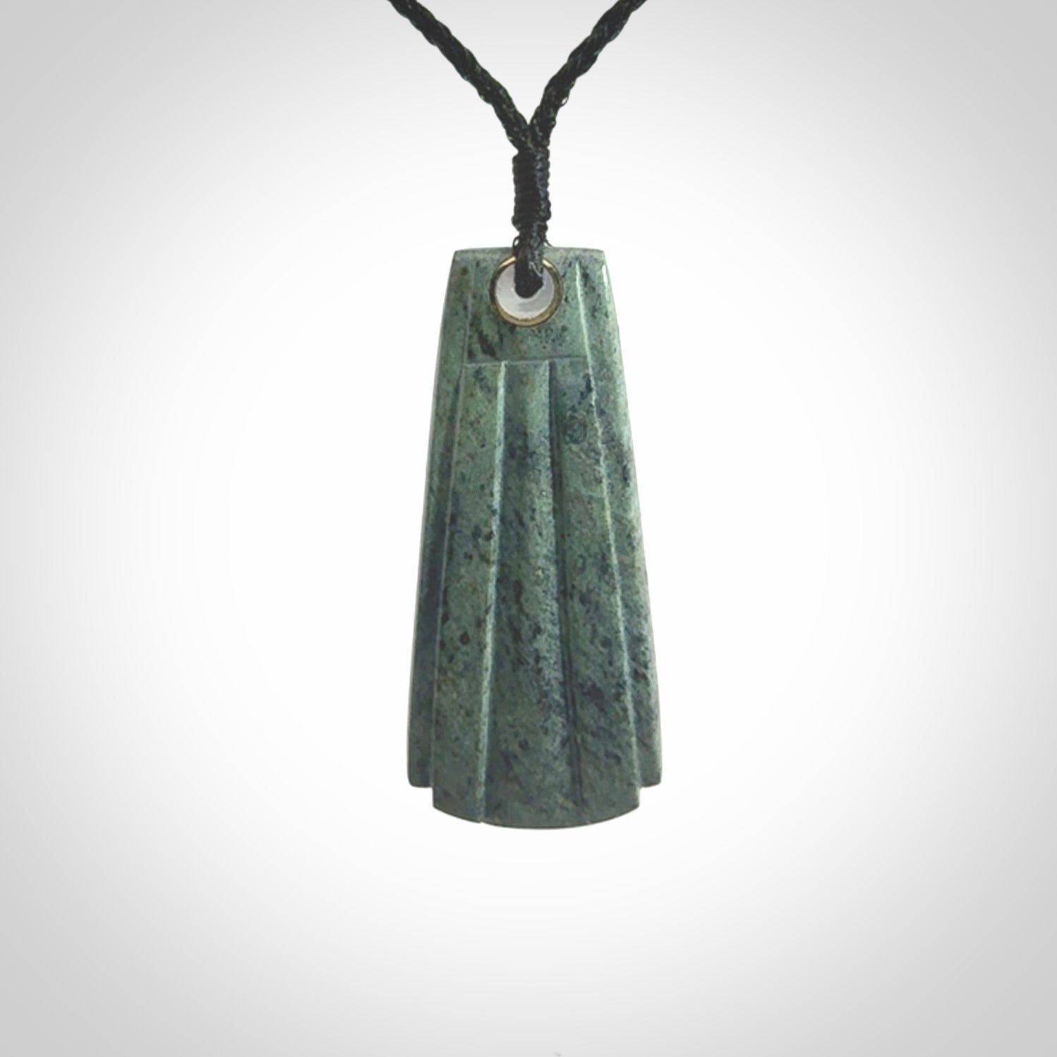 This is a wonderful New Zealand Jade Toki drop pendant.