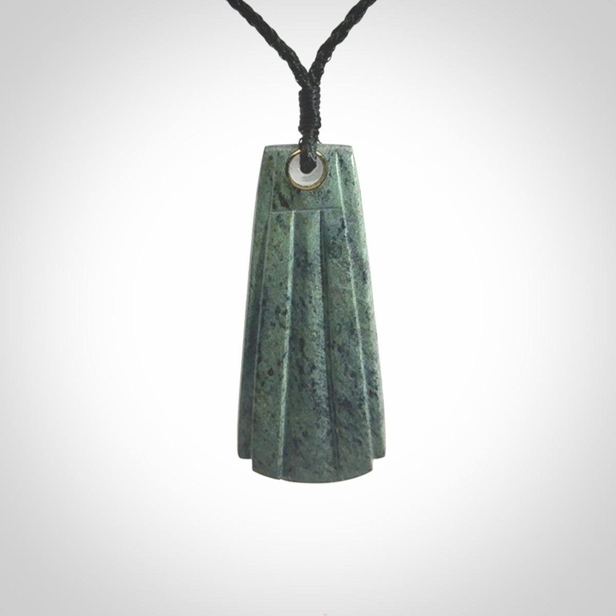 This is a wonderful New Zealand Jade Toki drop pendant.