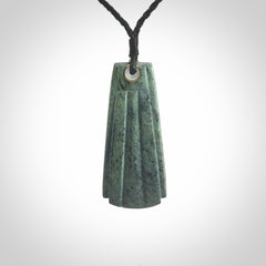 This is a wonderful New Zealand Jade Toki drop pendant.