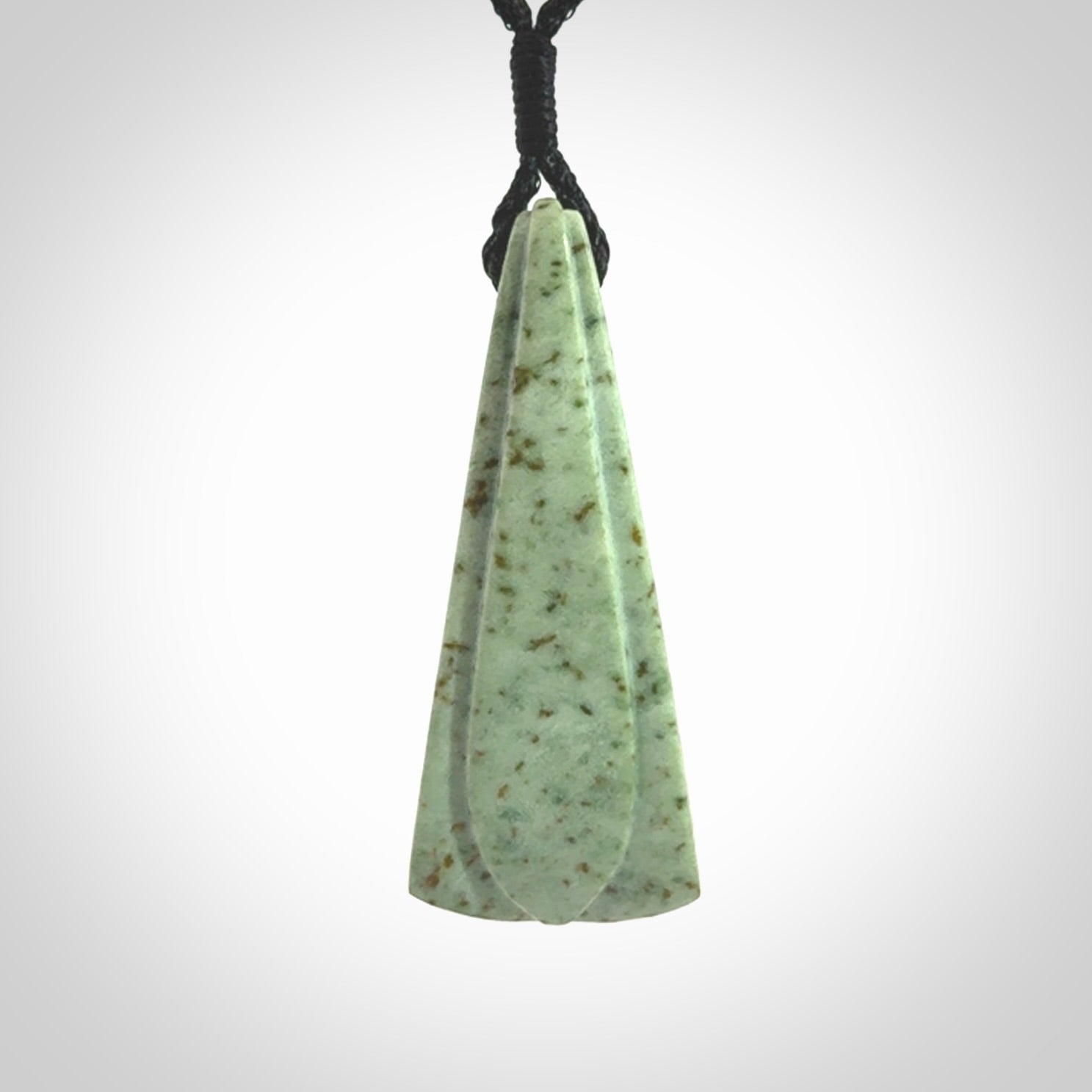 This is a wonderful New Zealand Kokopu Jade drop pendant.
