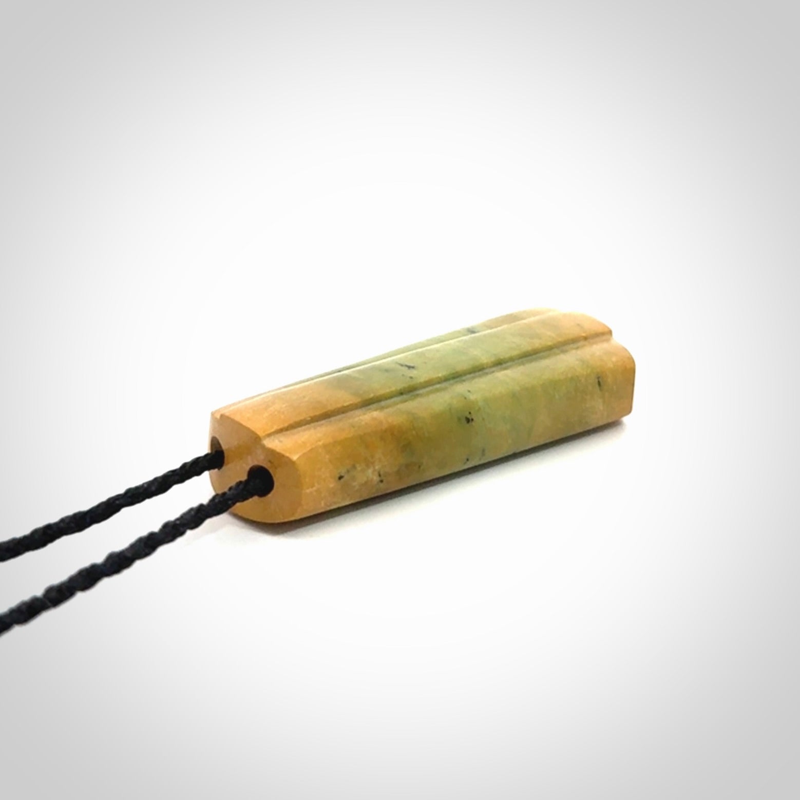 This is a wonderful New Zealand Jade toki pendant.