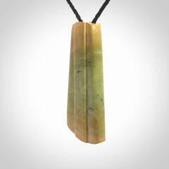 This is a wonderful New Zealand Jade toki pendant.