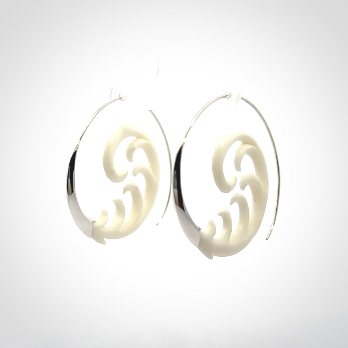 Hand carved earrings made from bone with sterling silver. NZ Pacific earrings for sale online.