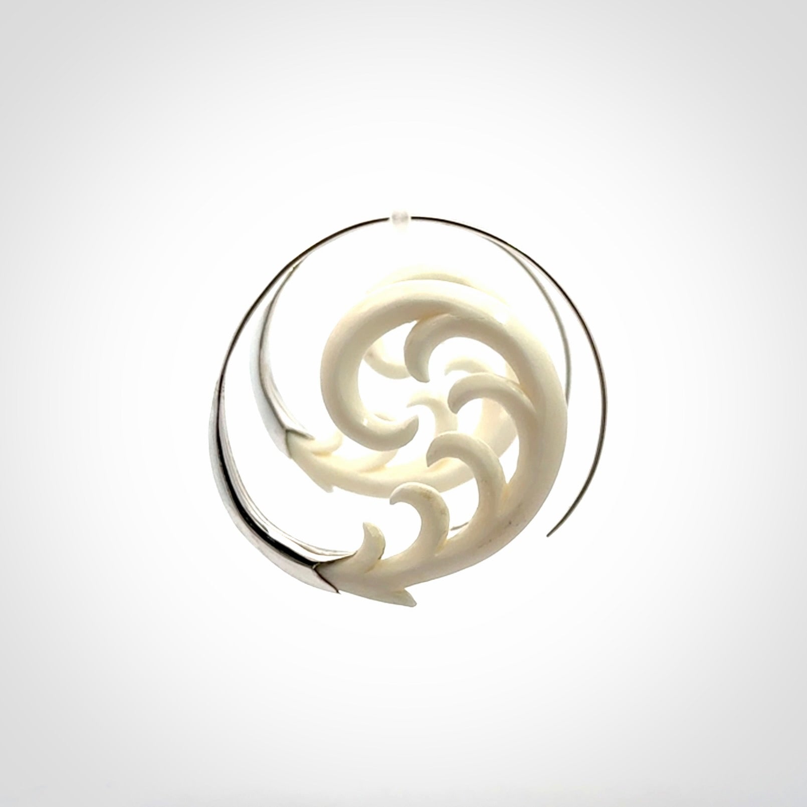 Hand carved earrings made from bone with sterling silver. NZ Pacific earrings for sale online.