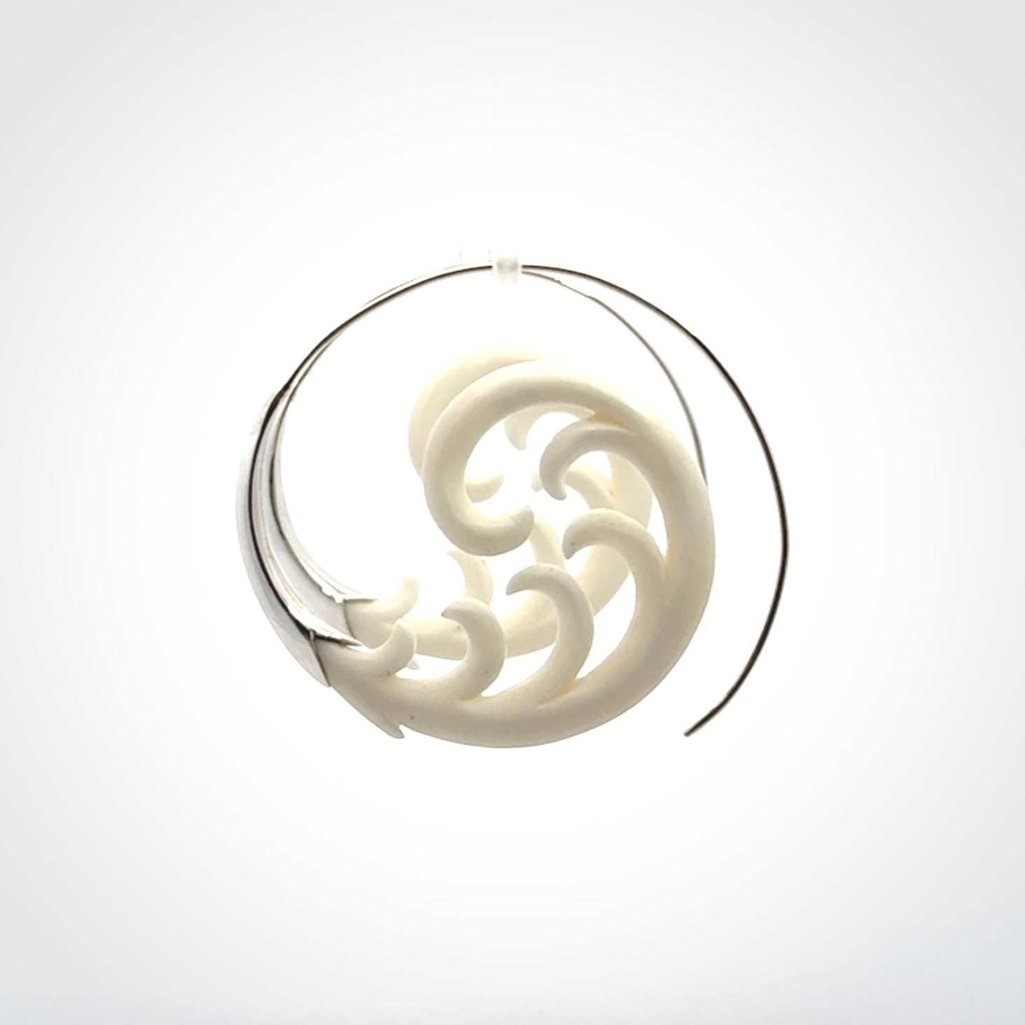 Hand carved earrings made from bone with sterling silver. NZ Pacific earrings for sale online.