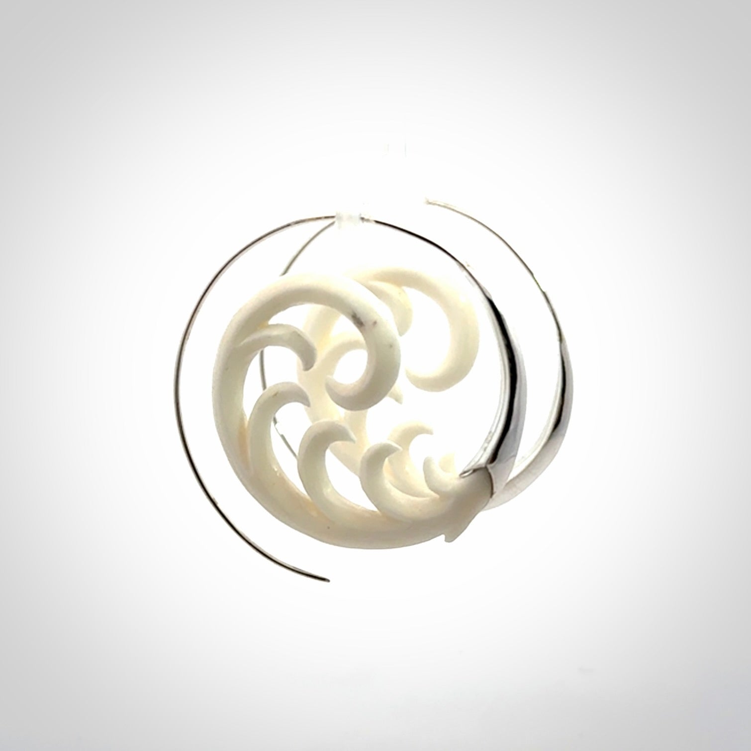Hand carved earrings made from bone with sterling silver. NZ Pacific earrings for sale online.
