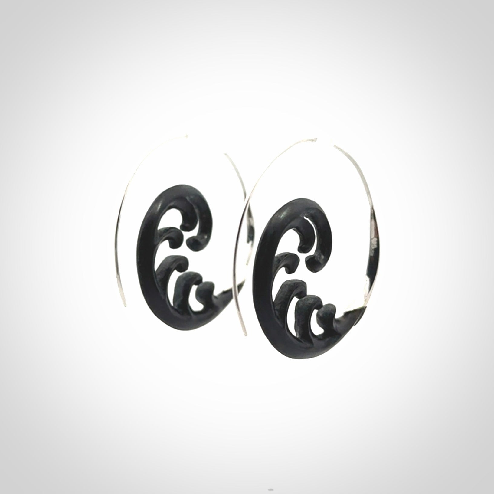 Hand carved hoop earrings, made from Black Jade with sterling silver. An NZ Pacific design. Large Black Jade and Silver hoop earrings.