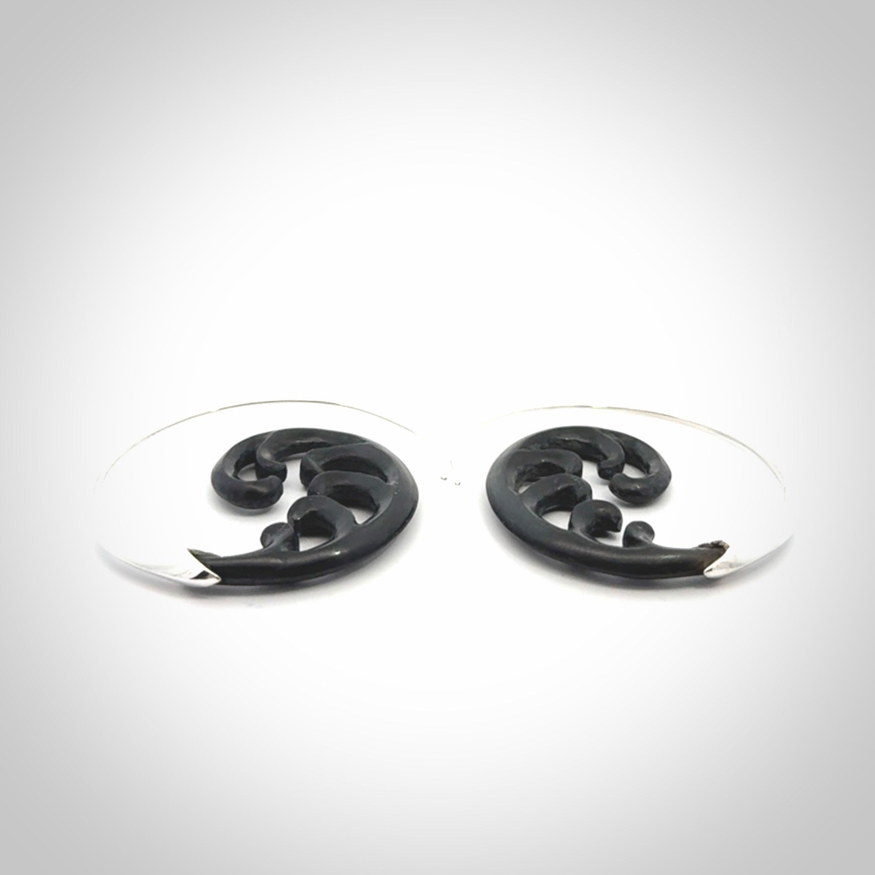 Hand carved hoop earrings, made from Black Jade with sterling silver. An NZ Pacific design. Large Black Jade and Silver hoop earrings.