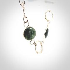 A photo of a sterling silver fashionable chain with New Zealand Jade. This is stylish womens statement piece - hand crafted here in New Zealand.