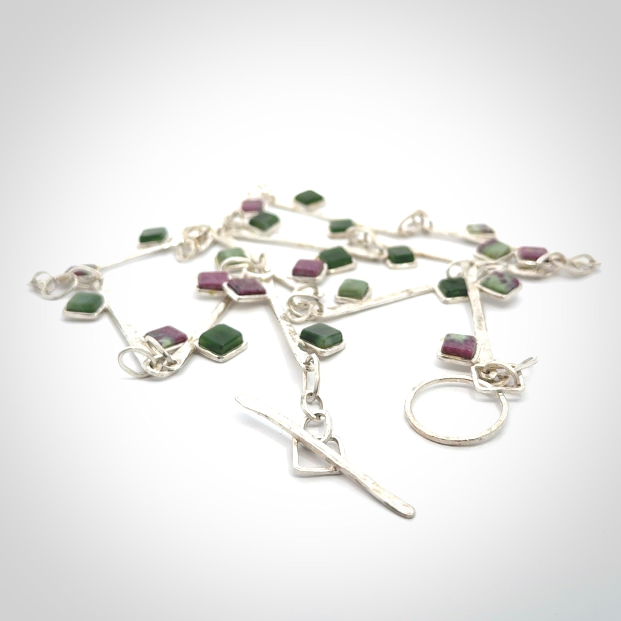Hand made jade and ruby sterling silver necklace.