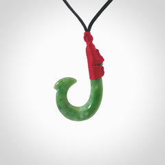 These pendants are hand carved, green jade Hawaiian hooks or Makau pendants. They are beautifully finished in a high polish and bound with an adjustable cord. Hand made jewellery that make the most wonderful gifts. Free shipping worldwide.