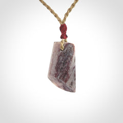 Hand carved Aroha stone toki pendant