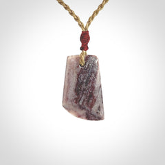 Hand carved Aroha stone toki pendant