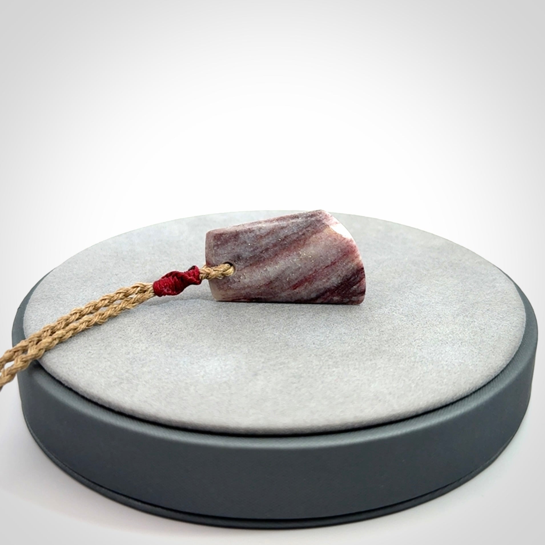 Hand carved Aroha stone toki pendant