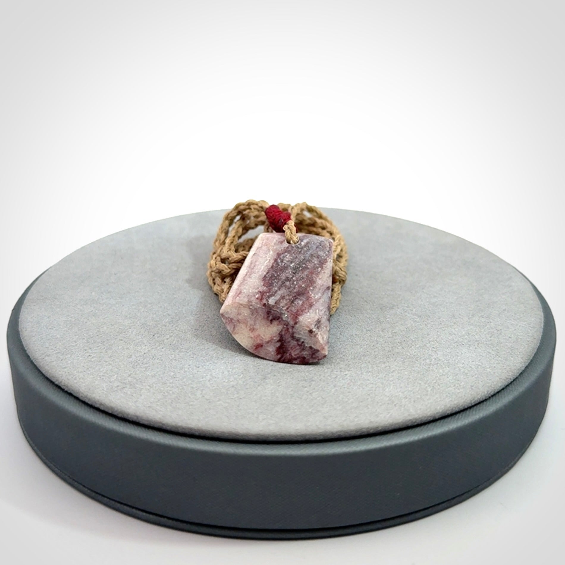 Hand carved Aroha stone toki pendant
