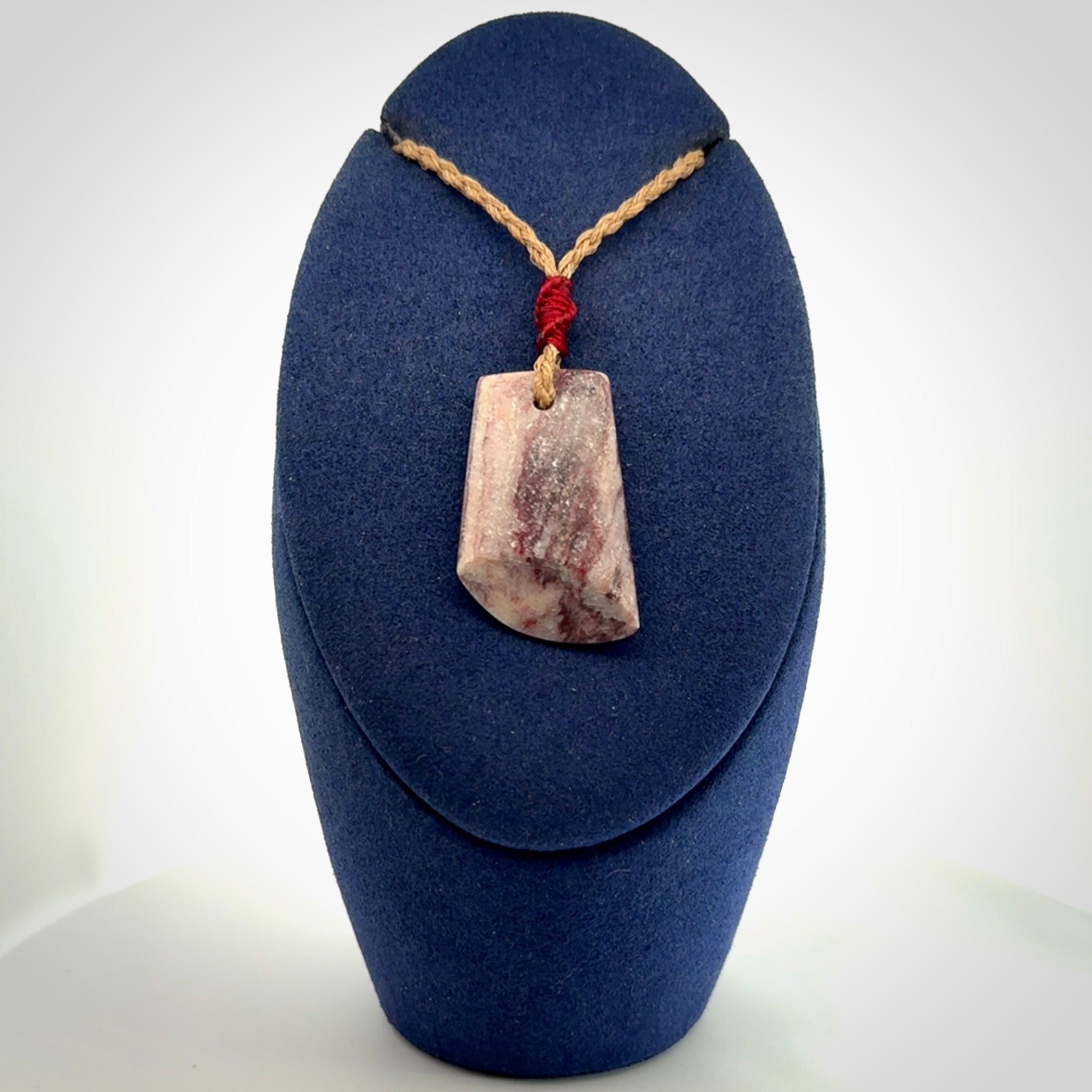 Hand carved Aroha stone toki pendant