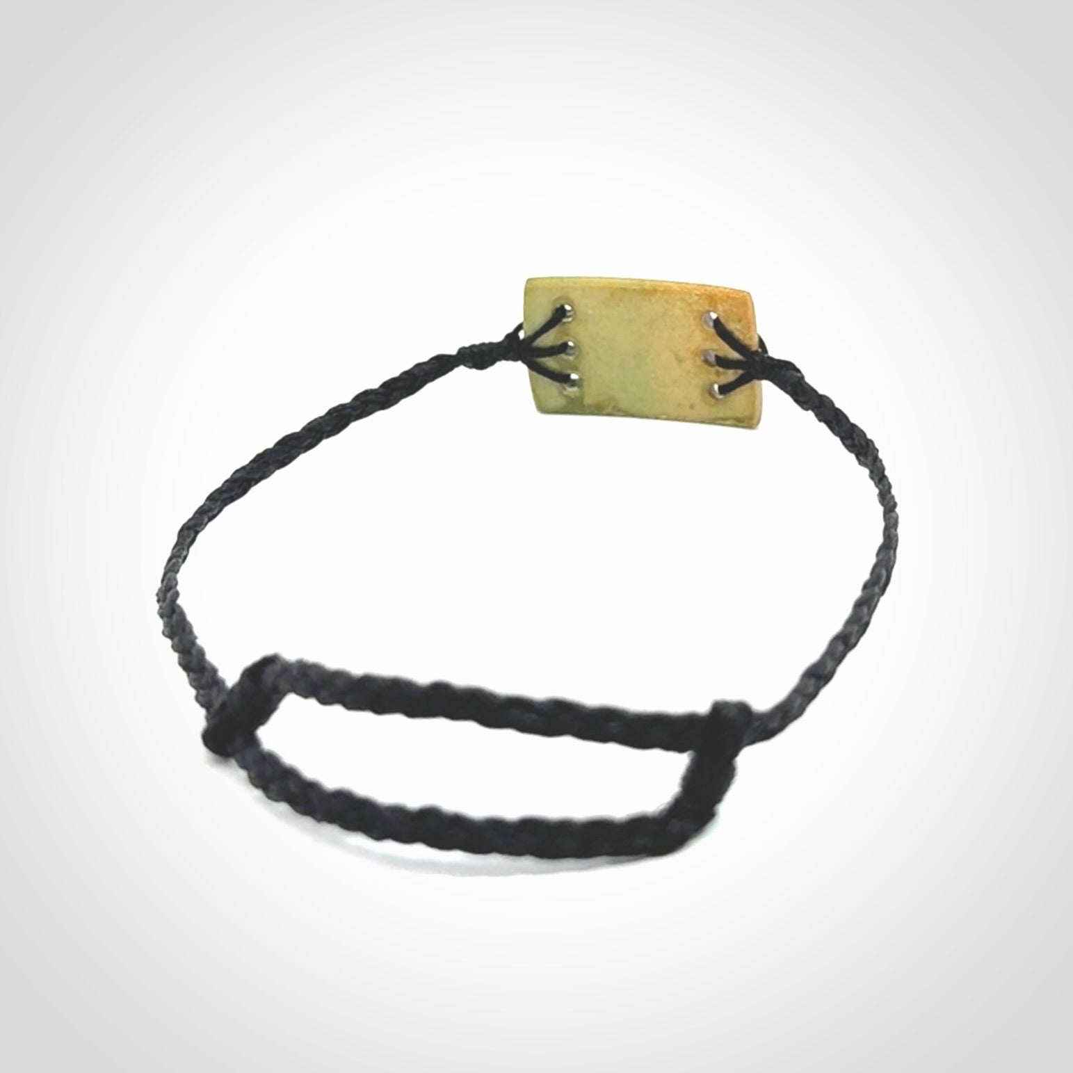 Hand carved New Zealand flower jade adjustable bracelet with black cord. One only armband for women and men.