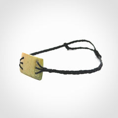 Hand carved New Zealand flower jade adjustable bracelet with black cord. One only armband for women and men.