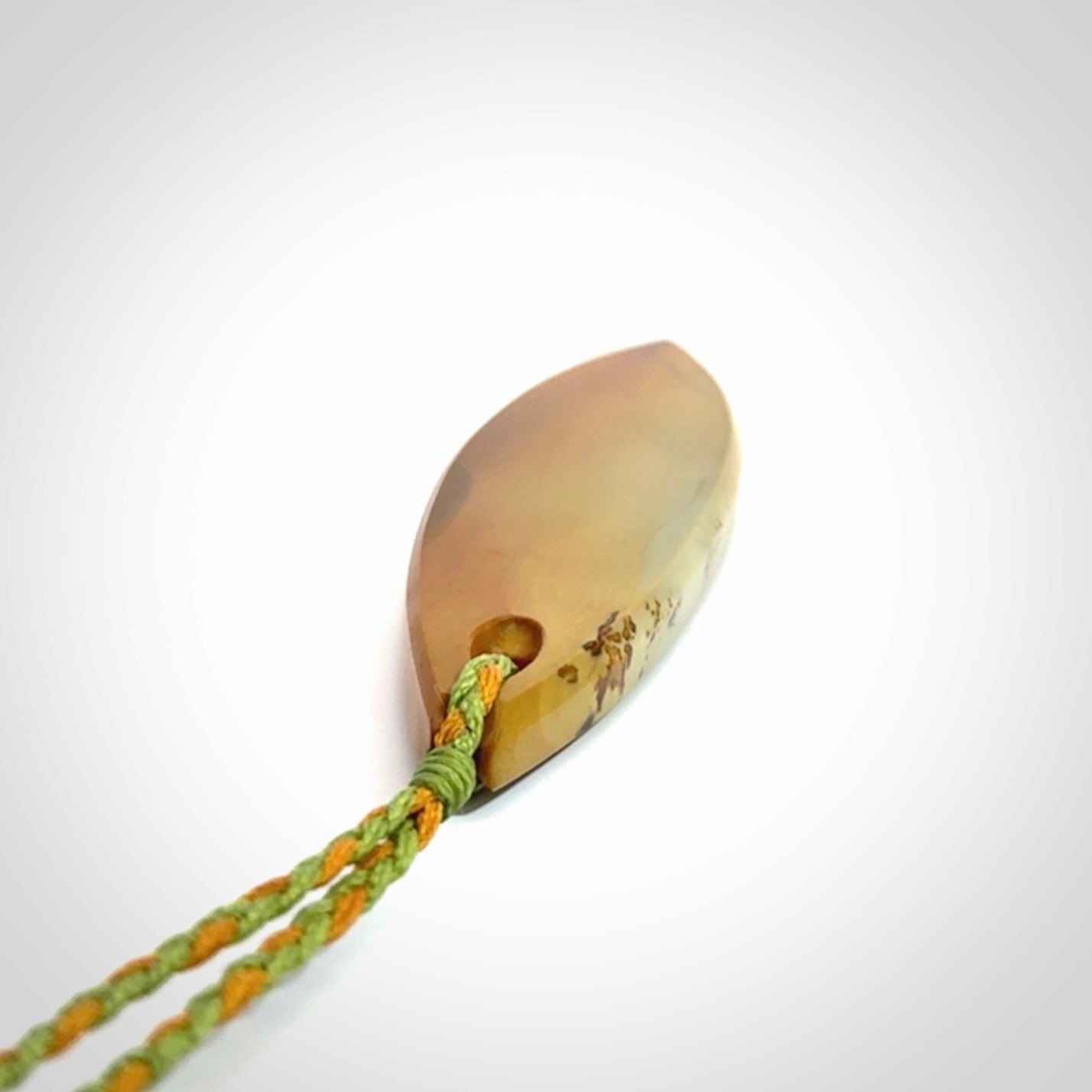 Hand carved New Zealand Flower Jade drop pendant.