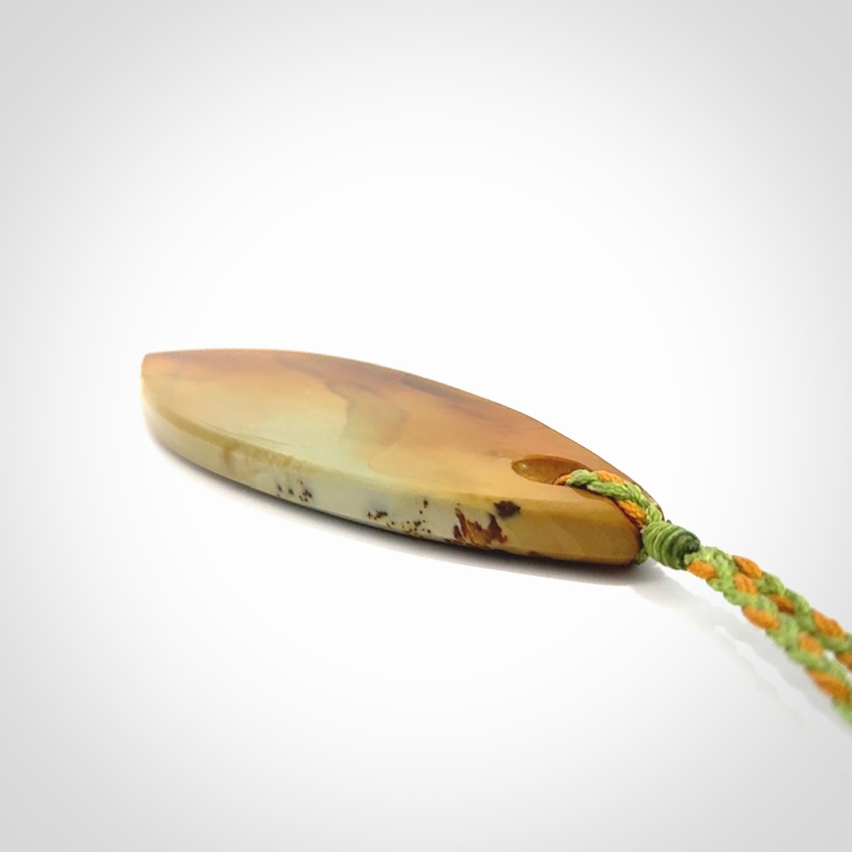 Hand carved New Zealand Flower Jade drop pendant.