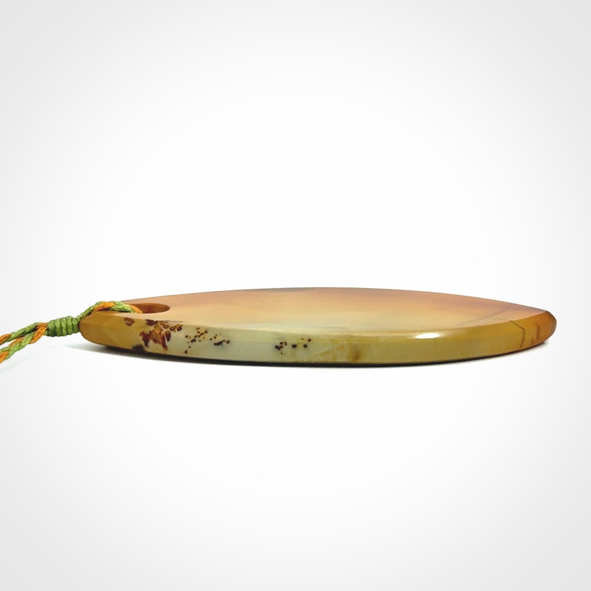 Hand carved New Zealand Flower Jade drop pendant.