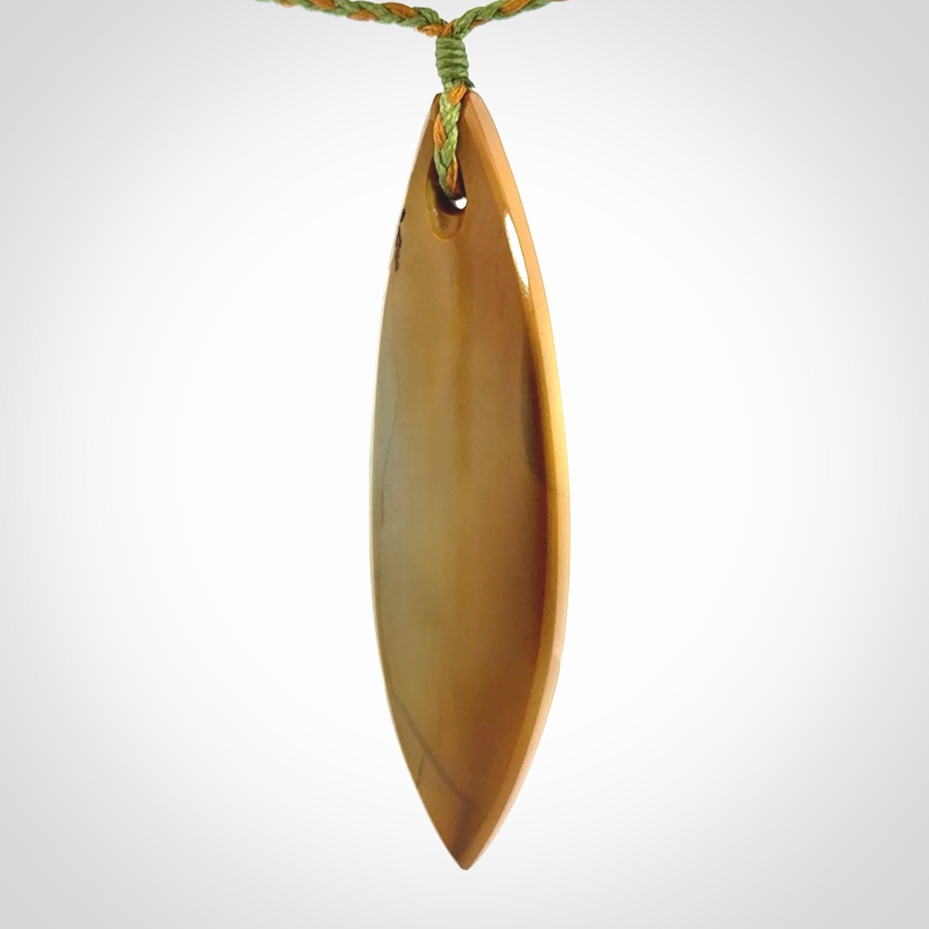 Hand carved New Zealand Flower Jade drop pendant.