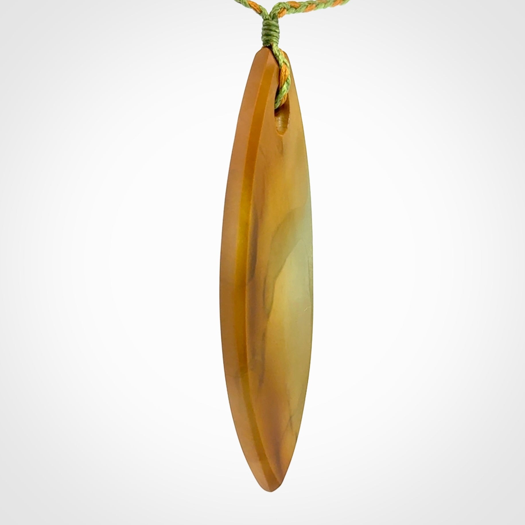 Hand carved New Zealand Flower Jade drop pendant.