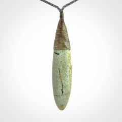 This picture shows a beautiful large sized drop pendant carved in New Zealand Jade, pounamu. A gorgeous and very meaningful pendant with an adjustable cord.