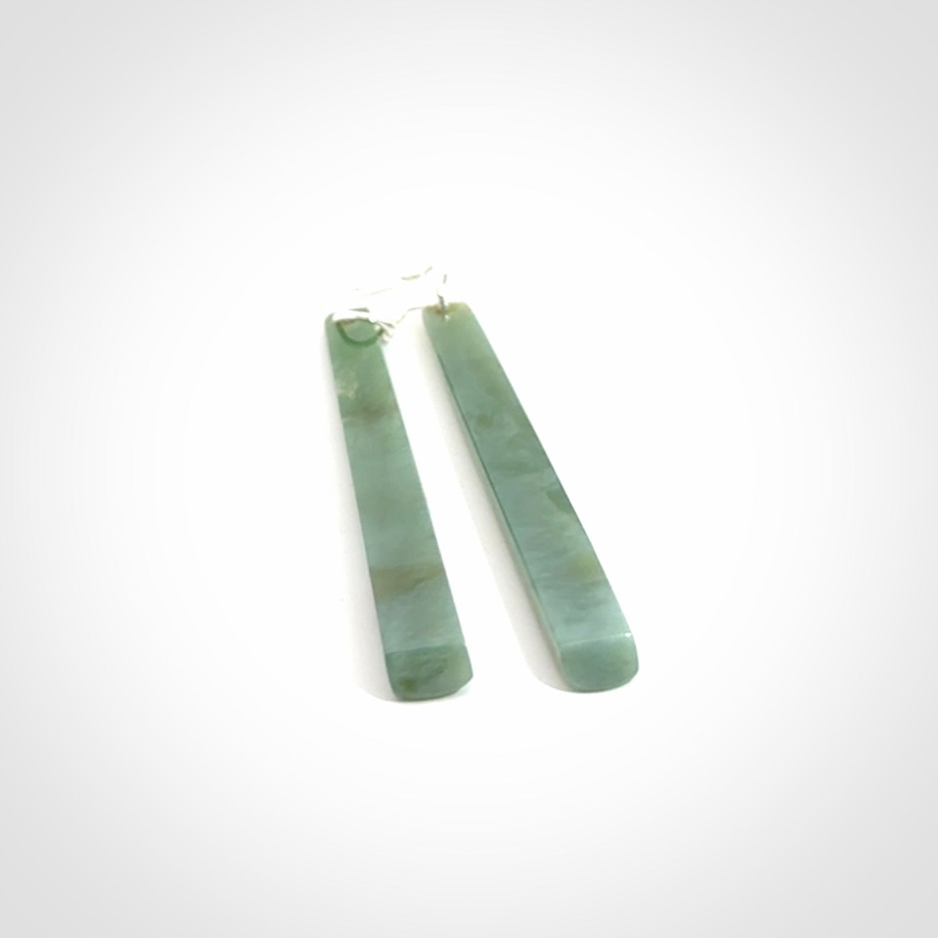 These are stunning drop shaped jade earrings carved in New Zealand Inanga Jade and with Sterling Silver hook and findings.