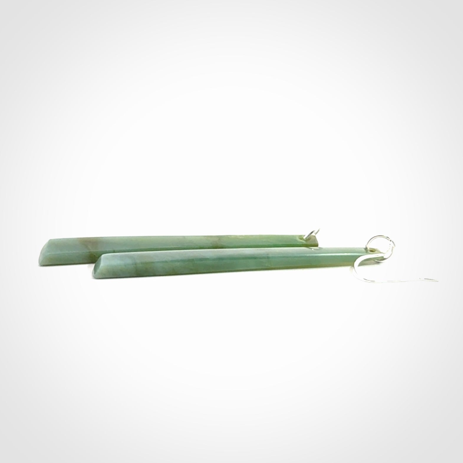 These are stunning drop shaped jade earrings carved in New Zealand Inanga Jade and with Sterling Silver hook and findings.