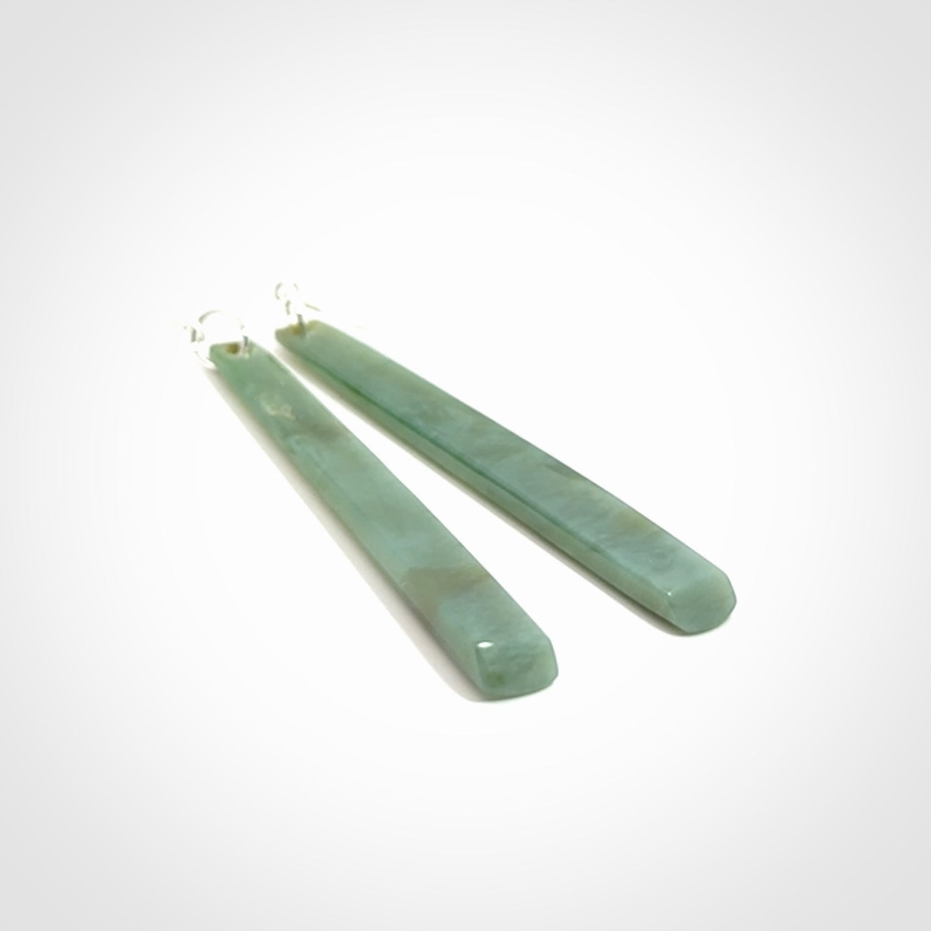 These are stunning drop shaped jade earrings carved in New Zealand Inanga Jade and with Sterling Silver hook and findings.