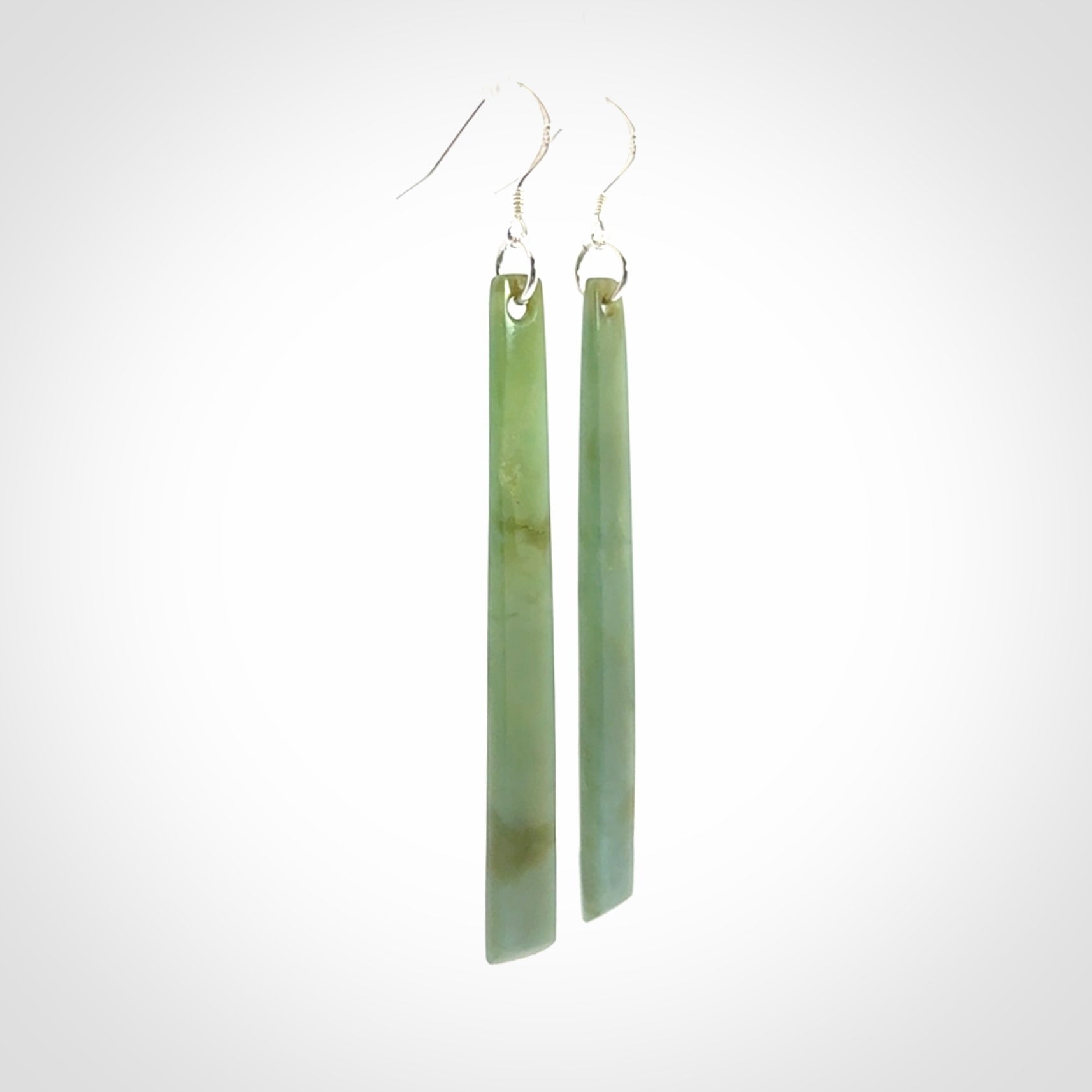 These are stunning drop shaped jade earrings carved in New Zealand Inanga Jade and with Sterling Silver hook and findings.