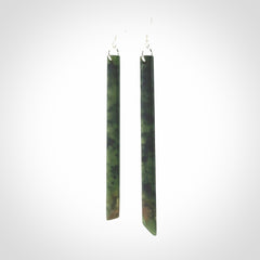 These are stunning large sized drop flower jade earrings carved in New Zealand. It is carved from a beautiful green piece of New Zealand Flower Jade and with Sterling Silver hooks and findings.