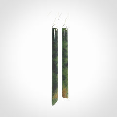 These are stunning large sized drop flower jade earrings carved in New Zealand. It is carved from a beautiful green piece of New Zealand Flower Jade and with Sterling Silver hooks and findings.