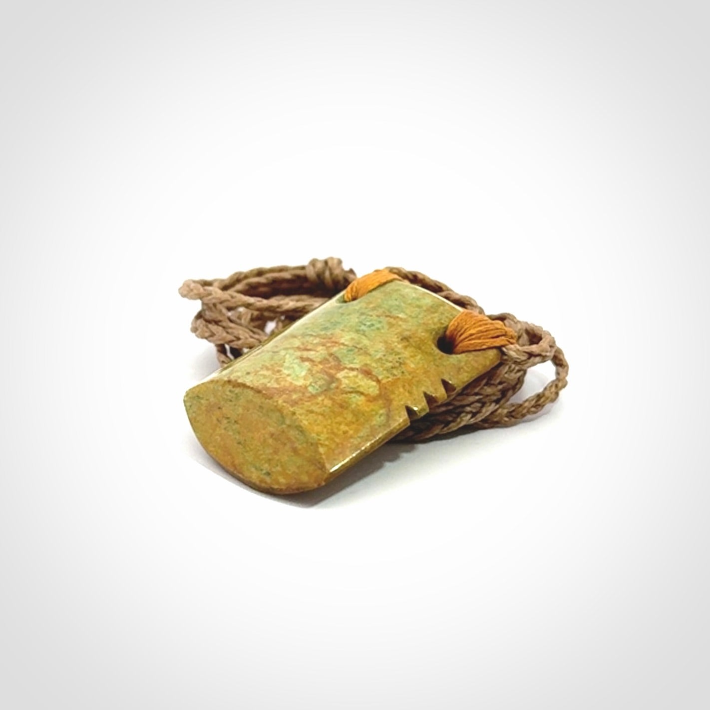 Hand carved New Zealand Flower Jade drop pendant.