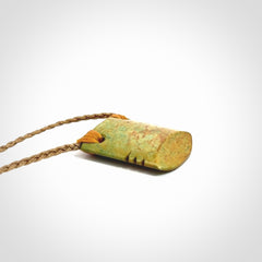 Hand carved New Zealand Flower Jade drop pendant.