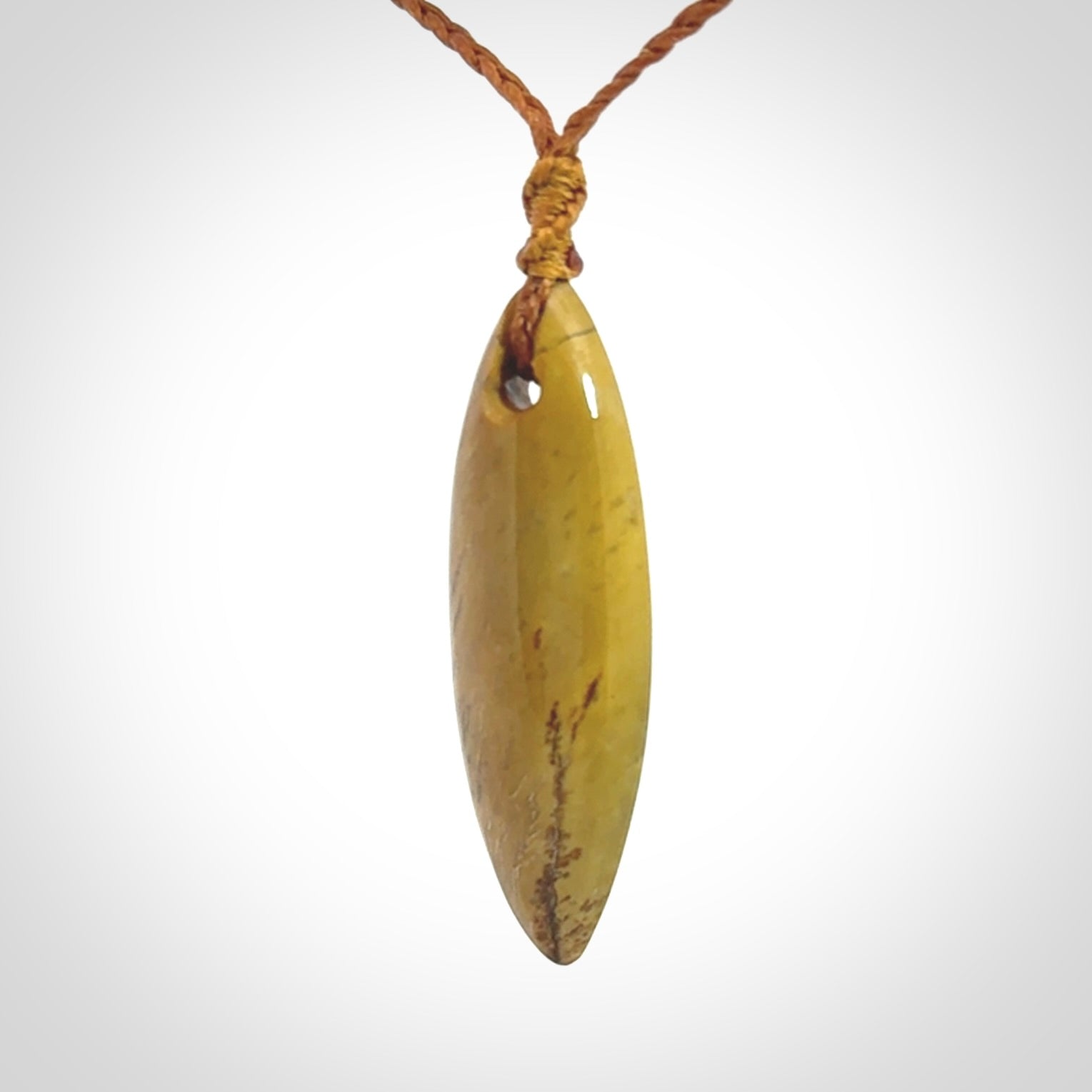 Hand carved New Zealand Flower Jade drop pendant.