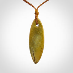 Hand carved New Zealand Flower Jade drop pendant.